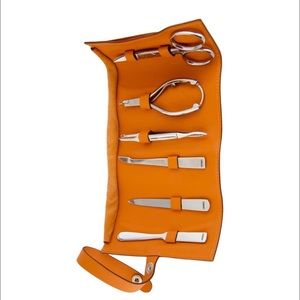 Hermès 7 piece stainless Steele nail grooming set.